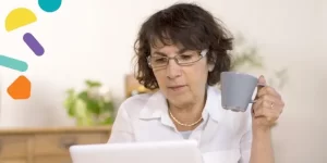 Elderly woman in front of a computer